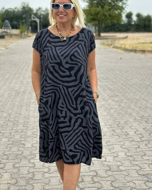 Nelia – Luchtige A-lijn Jurk met Zebra-Print - Selvina