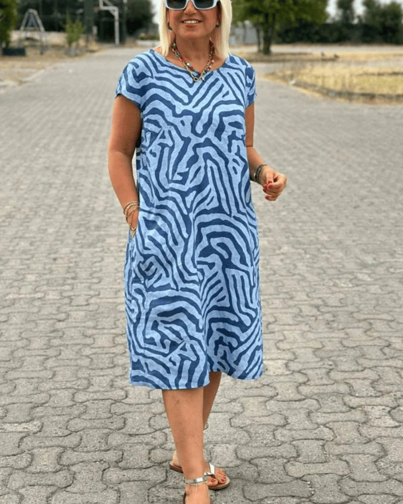 Nelia – Luchtige A-lijn Jurk met Zebra-Print - Selvina